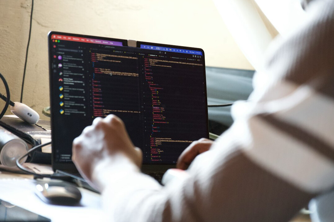 woman reviewing code