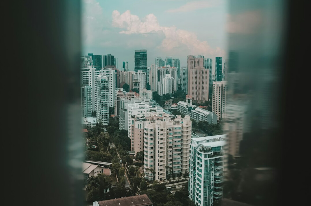 Modern coding classroom with the Singapore skyline visible through the window