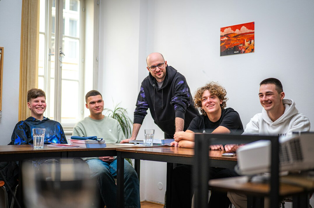 students coding together in classroom